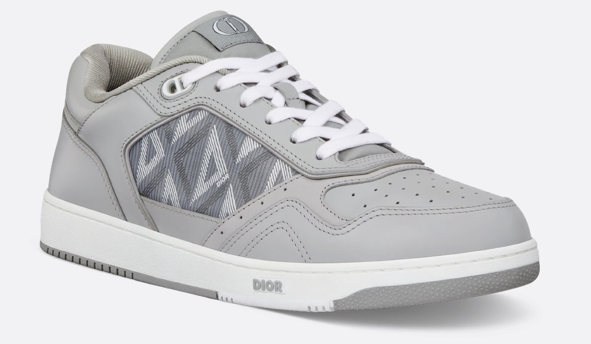 Dior B27 low-top sneakers in gray with CD Diamond canvas and white leather accents.